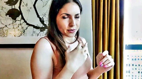 Seductive Euro stepmom teasing in pink tank top on vacation