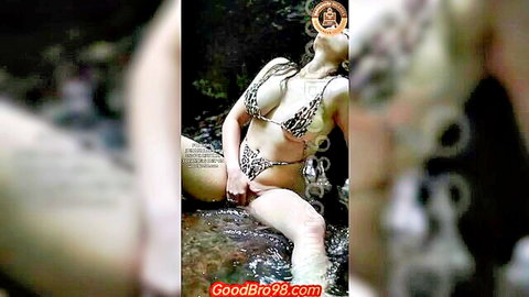 Seductive desi babe in skimpy leopard bikini posing wet in river, big ass tease