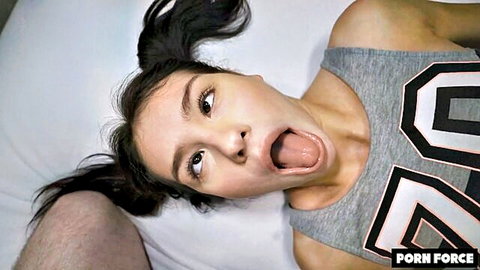 Asian woman with pigtails opens mouth wide in POV oral tease