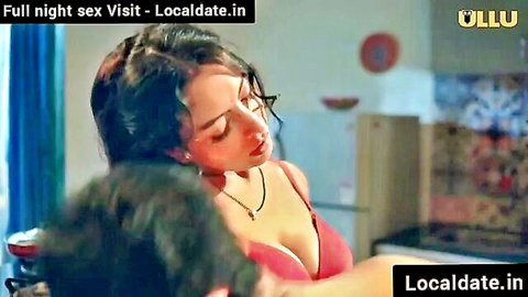 Desi woman in pink bra embraced intimately by man, Ullu series scene