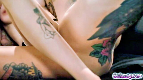Tattooed Robin Coffins nude, legs spread in intimate threesome comfort scene