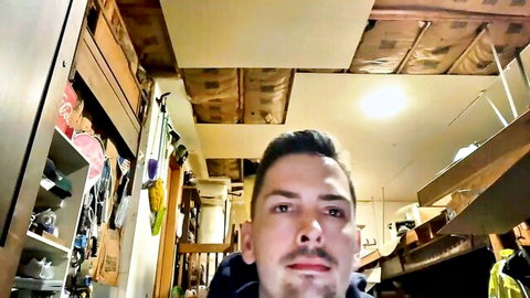 Black-haired man in hoodie preview for deep-throat porn video