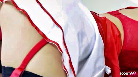 Sexy Asian nurse in white uniform and red lingerie, lying sideways for intimate exam