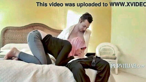 Busty Ella Knox in hijab gets fucked doggy style by white stepdad
