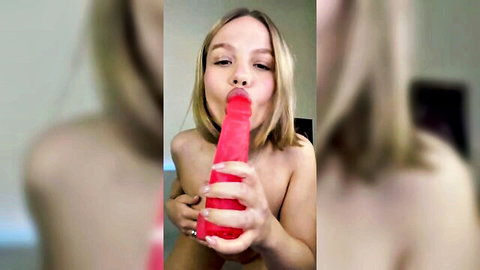 Beautiful blonde sucking red dildo topless solo masturbation