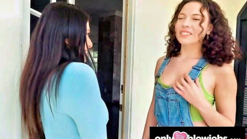 Two sexy Latina babes with cleavage in denim overalls and blue top flirting at neighbor door