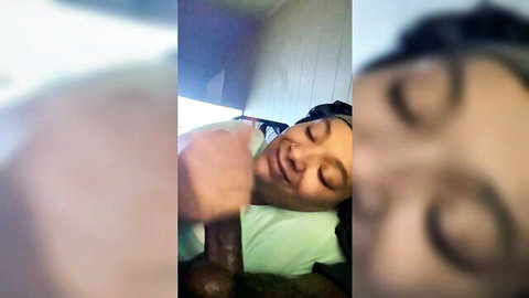 DaphneP ebony teen gives vicious blowjob to thick black cock, eyes closed in bliss