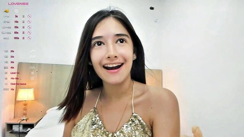 Skinny Greicy smiling in gold sequin top, sexy Latina cam girl