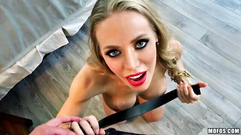 Nicole Aniston blonde cougar kneeling topless holding belt in POV