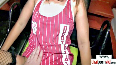 Thai babe in red tank top and fishnets teased by hand on inner thigh