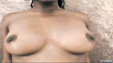 Candy Caprice ebony babe with big tits topless tease