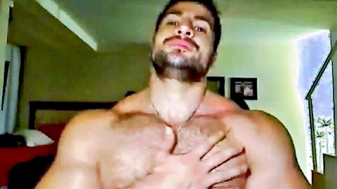 Hairy muscular daddy flexing his thick chest pecs