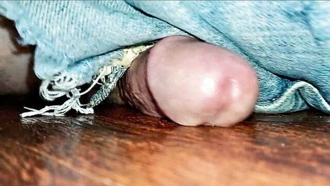 Ryan Sinns crossdresser exposes soft cock from jeans on floor