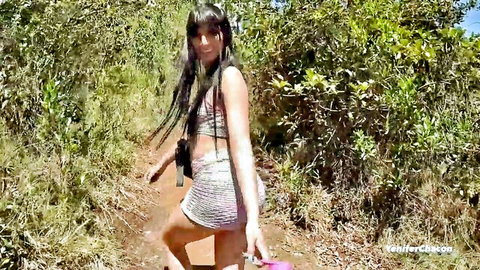 Curvy Venezuelan Latina in tiny patterned skirt and top walks teasingly through forest POV