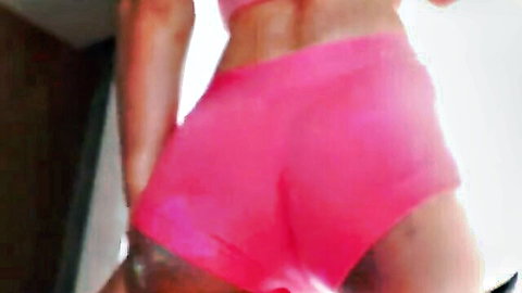 Petite Asian trans Cheraim in tight pink shorts, sexy rear view