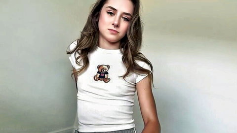 Daisy Fox pouting in white teddy bear t-shirt and gray shorts