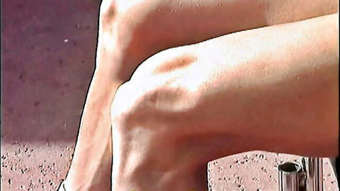 Smooth bare legs of muscle jock in school gang exercise scene