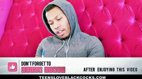 Mandy Muse in Writer's Block: black stud in hoodie ponders on pink backdrop