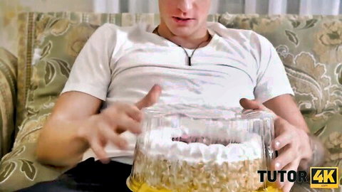 Martin Spell teasing with cake in white shirt, home amateur vibe