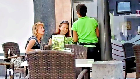 Blonde and brunette women at cafe in upskirt tease preview