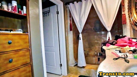 Empty bathroom interior with bathtub vanity and cosmetics in trans porn video