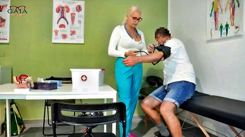 Blonde nurse Gaia On Top checks patient's blood pressure in medical roleplay