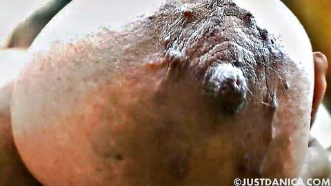 Danica facesitting on bald man close-up smothering