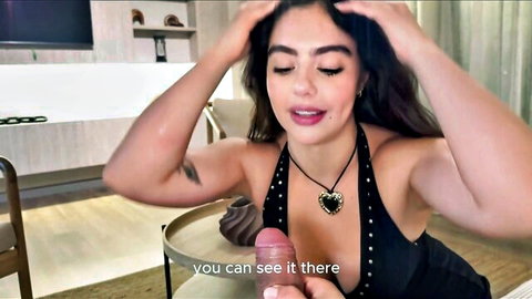 Tanned Latina babe with medium tits holds realistic cock dildo teasingly in her deep cleavage