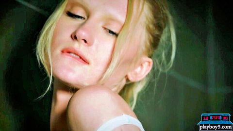 Blonde Russian petite MILF seductively posing for Playboy close-up
