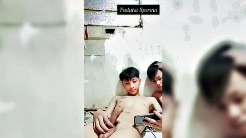 Two 20-year-old Asian twinks nude and masturbating on cam