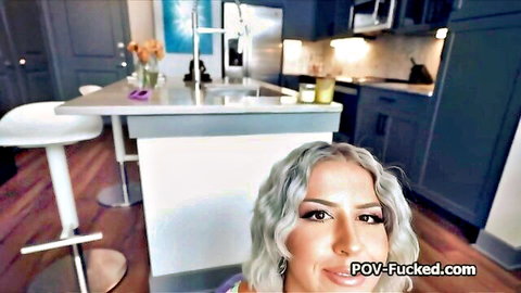 Silver-haired woman smiling in POV kitchen tease, great body for rent payment