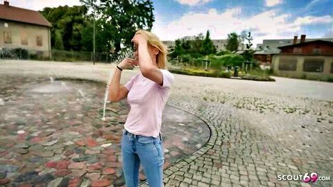 Blonde Melisa Rose lifting pink top in outdoor German Scout casting