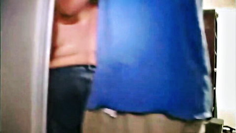Gorgeous BBW topless from side, teasing behind blue curtain