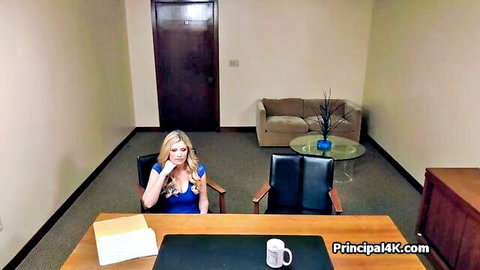 Blonde MILF teacher in tight blue dress at office desk showing big tits cleavage