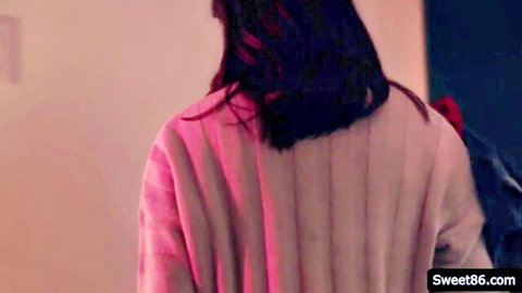Jaclyn Taylor back view in pink sweater, lesbian stepsisters scene