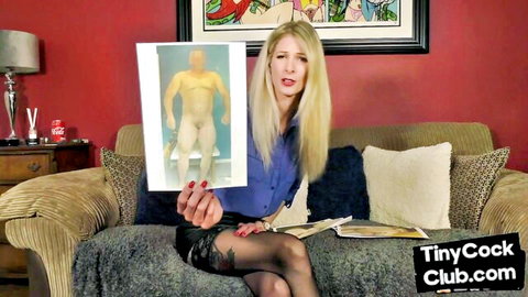 Blonde femdom holds tiny cock photo in humiliating solo tease