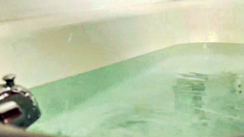 Tina Krause naked in green-tinted bathtub, Claw 2017 scene