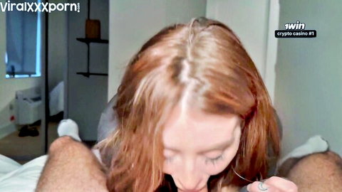 Rosie Rider redhead with huge tits in explicit blowjob scene