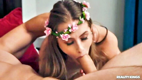 Flower-crowned nude babe gives intense blowjob on Valentine's Day