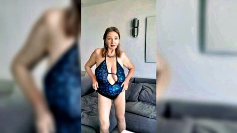 Mature GILF in sexy blue lingerie flaunting her huge natural tits