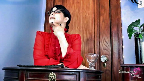 Brookelynne Briar as strict teacher in red ruffled blouse, glasses, schoolboy fantasy tease