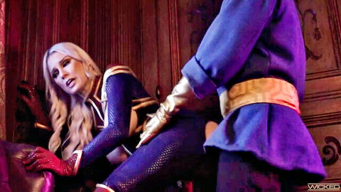 Kenzie Taylor in blue latex superhero cosplay grabbed by Ryan Driller in comic scene