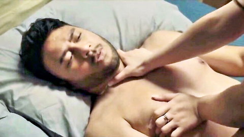 Julia Victoria hand on throat of shirtless Asian man in Kabayo 2023 nude scene