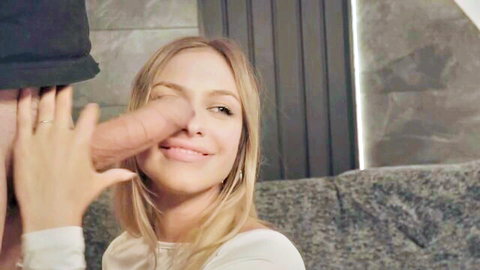 Blonde Paige smiles as big cock nears her face in teasing blowjob preview