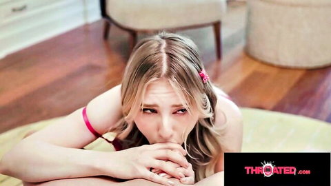 Blonde babe kneels intensely with hands clasped to mouth ready for deep throat blowjob