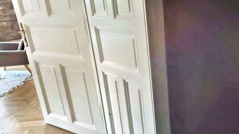 Daniela Hansson in elegant check-in scene, all sides of fun adult video thumbnail