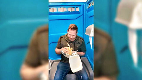 Man eating fries in porta-potty, Porn Shame 2025 style humiliation