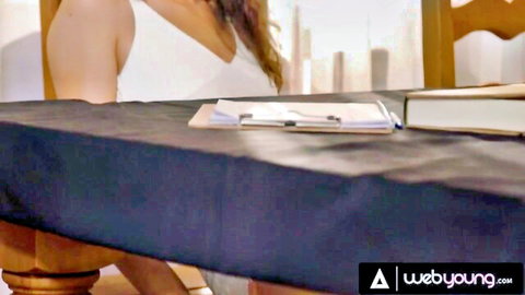 Haley Reed and Liz Jordan in white top teasing under table, lesbian vibe