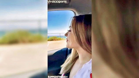 Anna Claire Clouds teases seductively in car by beach in white blouse