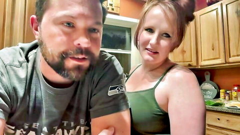 Trublueyez3 couple in casual kitchen chat, cleavage tease with tattoos